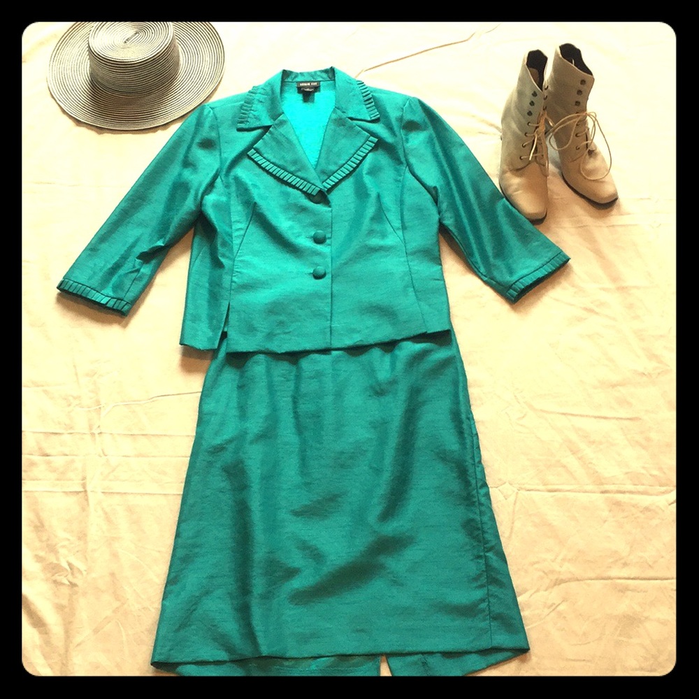 Formal blue skirt suit.